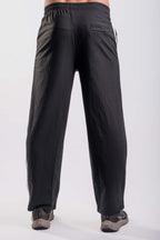 Aura Track Pants black rear view with elastic waistband