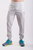 Signature Fit white jogger pants front view with cuffed ankles