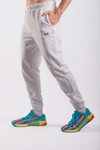 White men’s joggers with side pocket and MM Essentiels logo